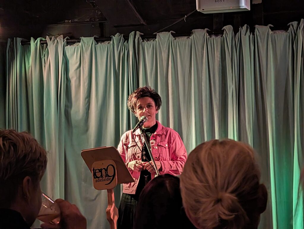Jodie Atkinson reading at a speaking event